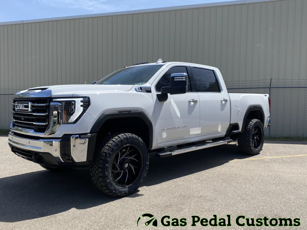 GMC Sierra with Readylift level kit, Fuel wheels, and Nitto tires.