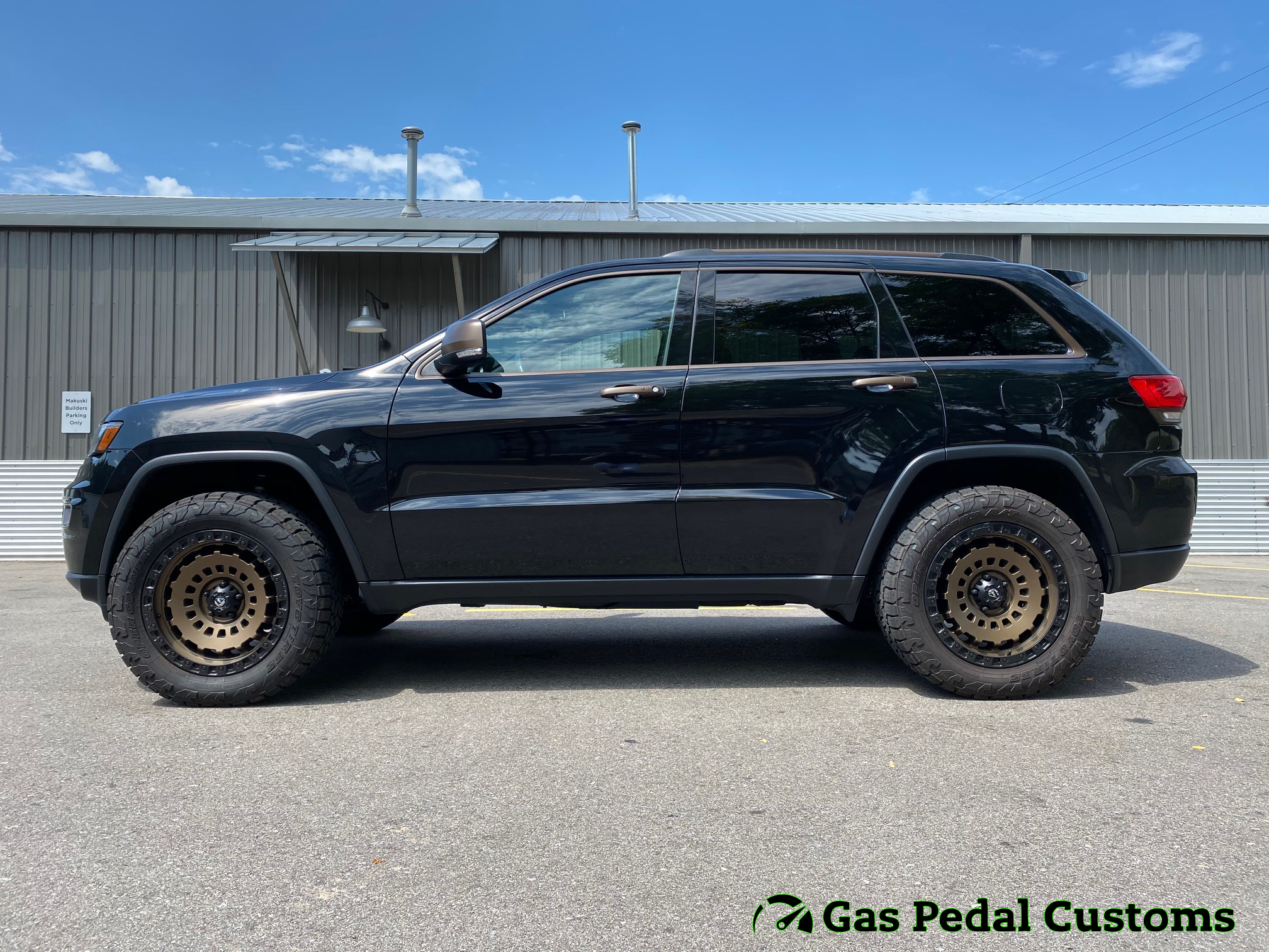 Jeep Grand Cherokee with a lift, Fuel wheels, and Toyo tires